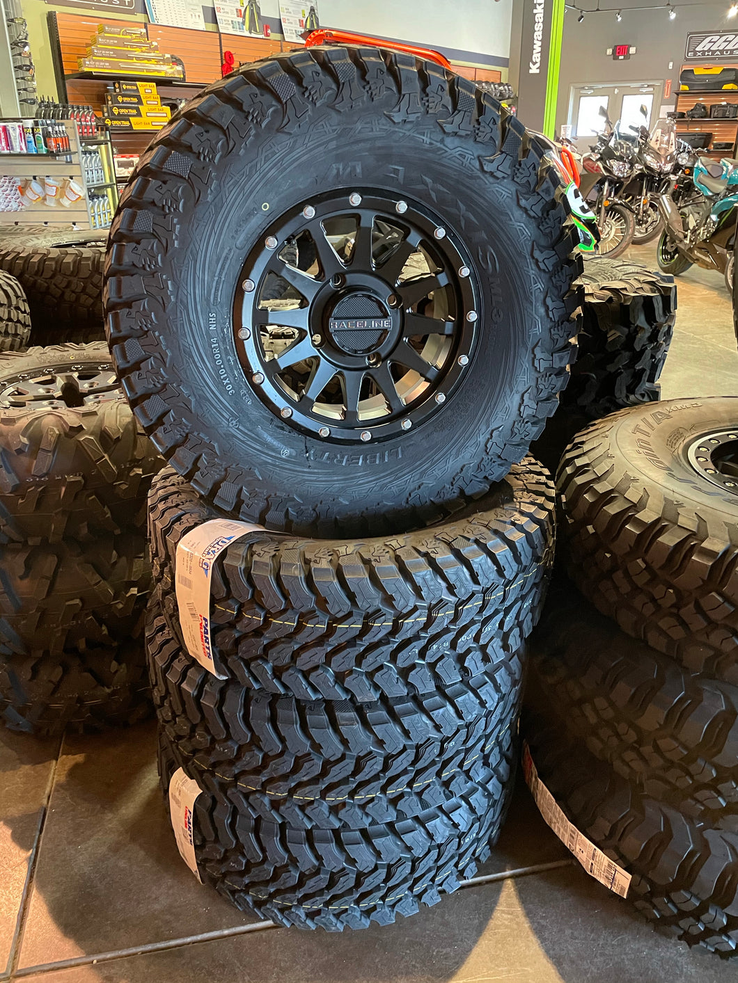 30” MAXXIS LIBERTY TIRES 14” RACELINE TROPHY WHEELS CANAM